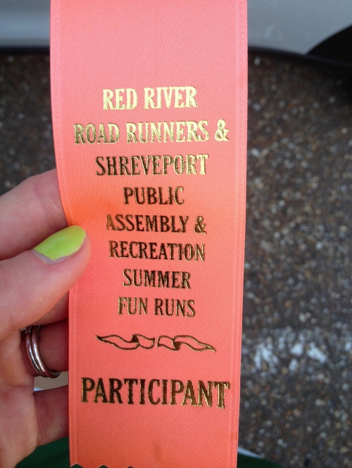 Participant ribbon from one of the local summer fun runs. 